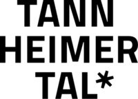 Schriftzug TANIN HEIMED mit Schneeflockensymbol